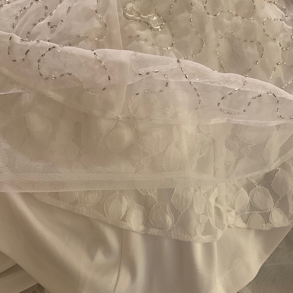 MAC DUGGAL
Hand Embellished Sleeveless Beaded Gown with Sweeping Train - Picture 13 of 15